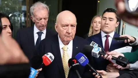 Sex Abuse Charges Against Leading Australian Radio Host Lessened